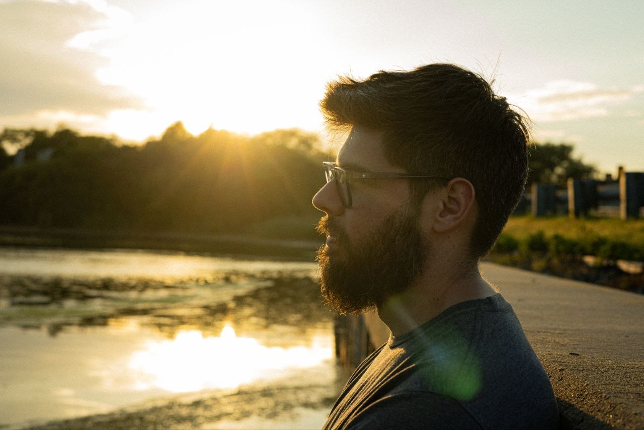 Andres Ortiz — profile portrait at sunset by the water